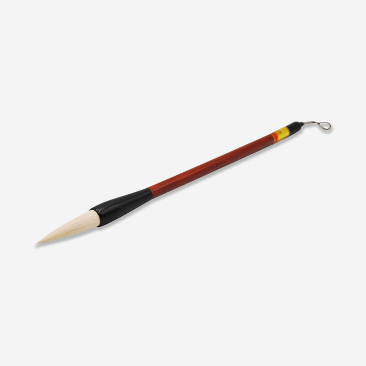 Medium sized goat hair Sumi brush that works great for applying slip, underglaze, and glaze.