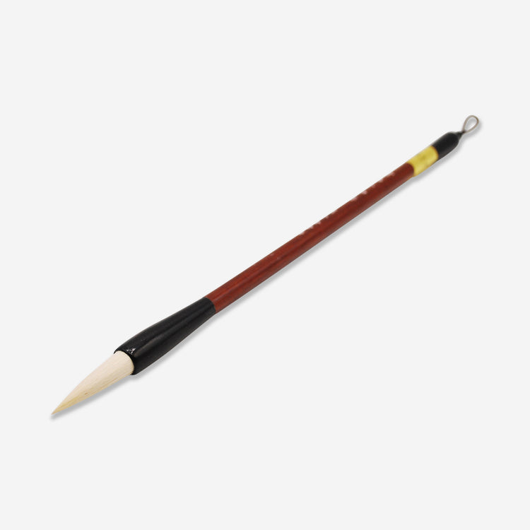 Small sized goat hair Sumi brush that works great for applying slip, underglaze, and glaze.