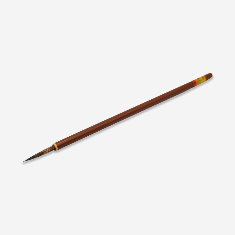 This detail brush is a small, fine line Sumi brush that works great for painting detailed work with underglaze.