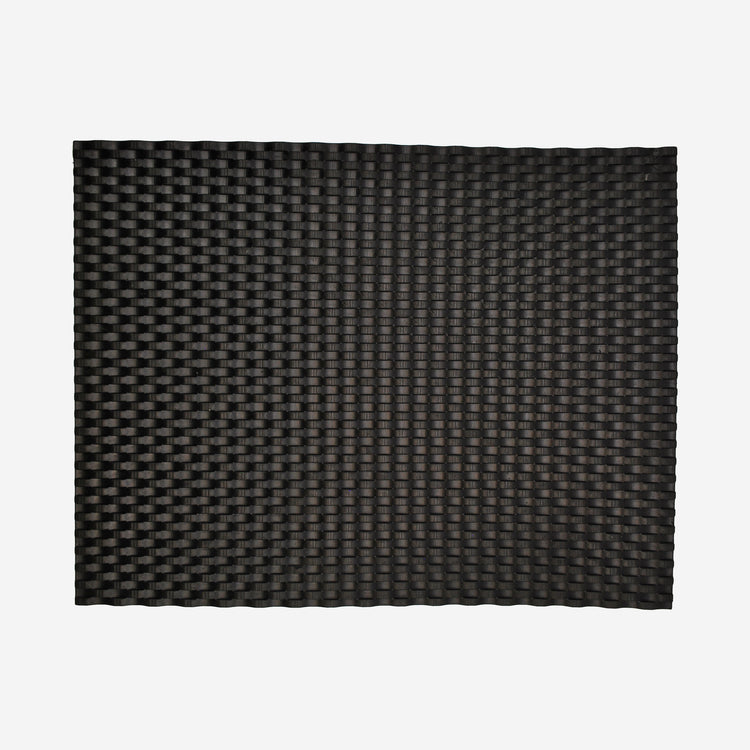 Textured mat that has a basket weave pattern.