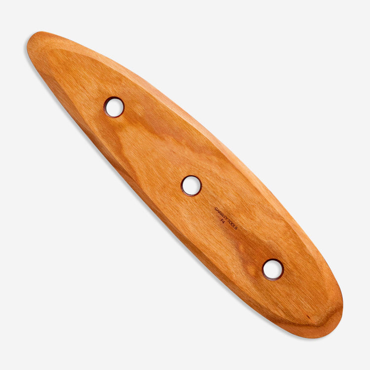 F4 is one of our largest tools and can help create tall vessels or wide
plates. Plus, the rounded ends come in handy to clean and compress
projects of any size.