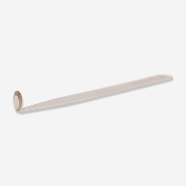 The #9 stainless steel tool has a small rounded head for trimming curves.