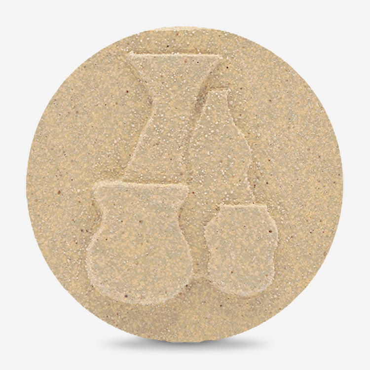 WC843 is a mid range, cone 5/6 light orange clay fired in oxidation and dark orange in reduction.