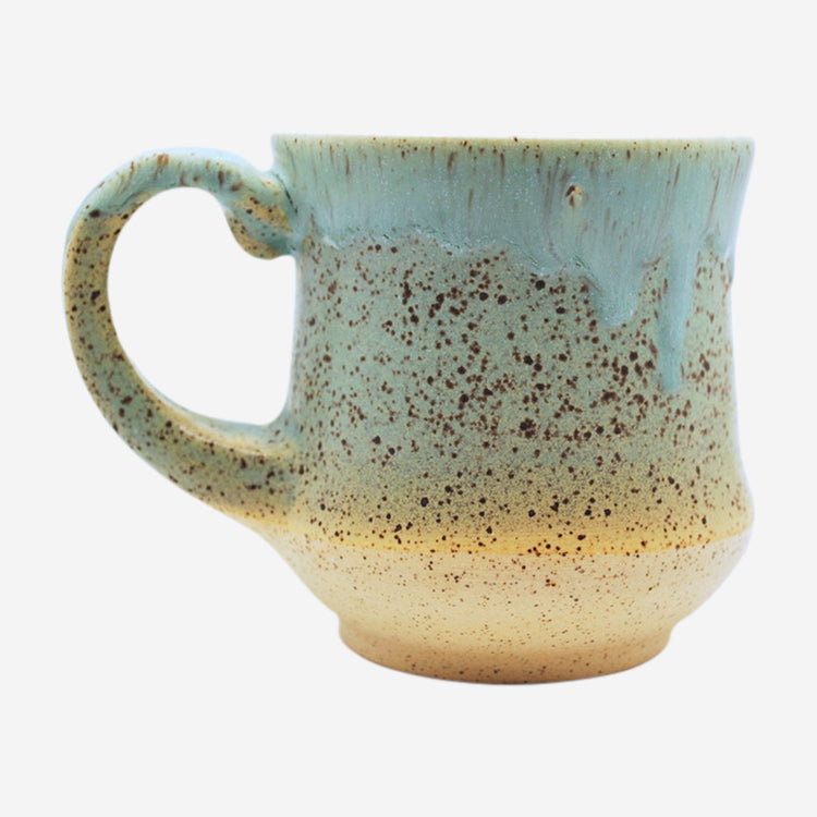 Teal Drippy Mug by Robbie Torres