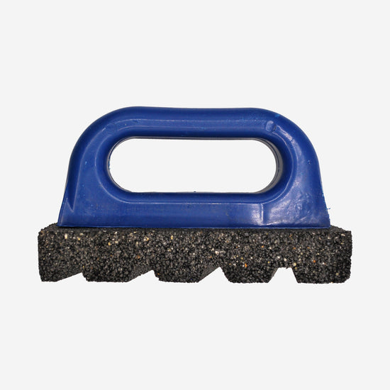 20 grit carbide cleaning brick with handle that is used for scraping off glaze drips on kiln washed shelves.