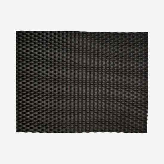 Textured mat that has a basket weave pattern.