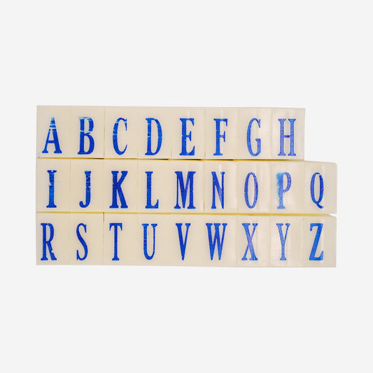Full alphabet of capital letter rubber stamps.